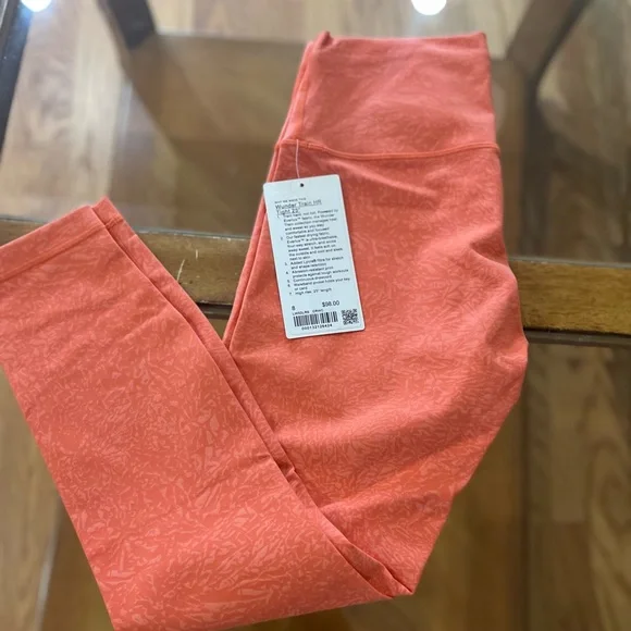 Lululemon Wunder Train High-Rise Tight 25"
Crunch Warm Coral - Picture 3 of 4